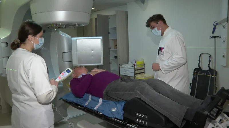 Care teams help patients find an optimal and comfortable position before treatment.